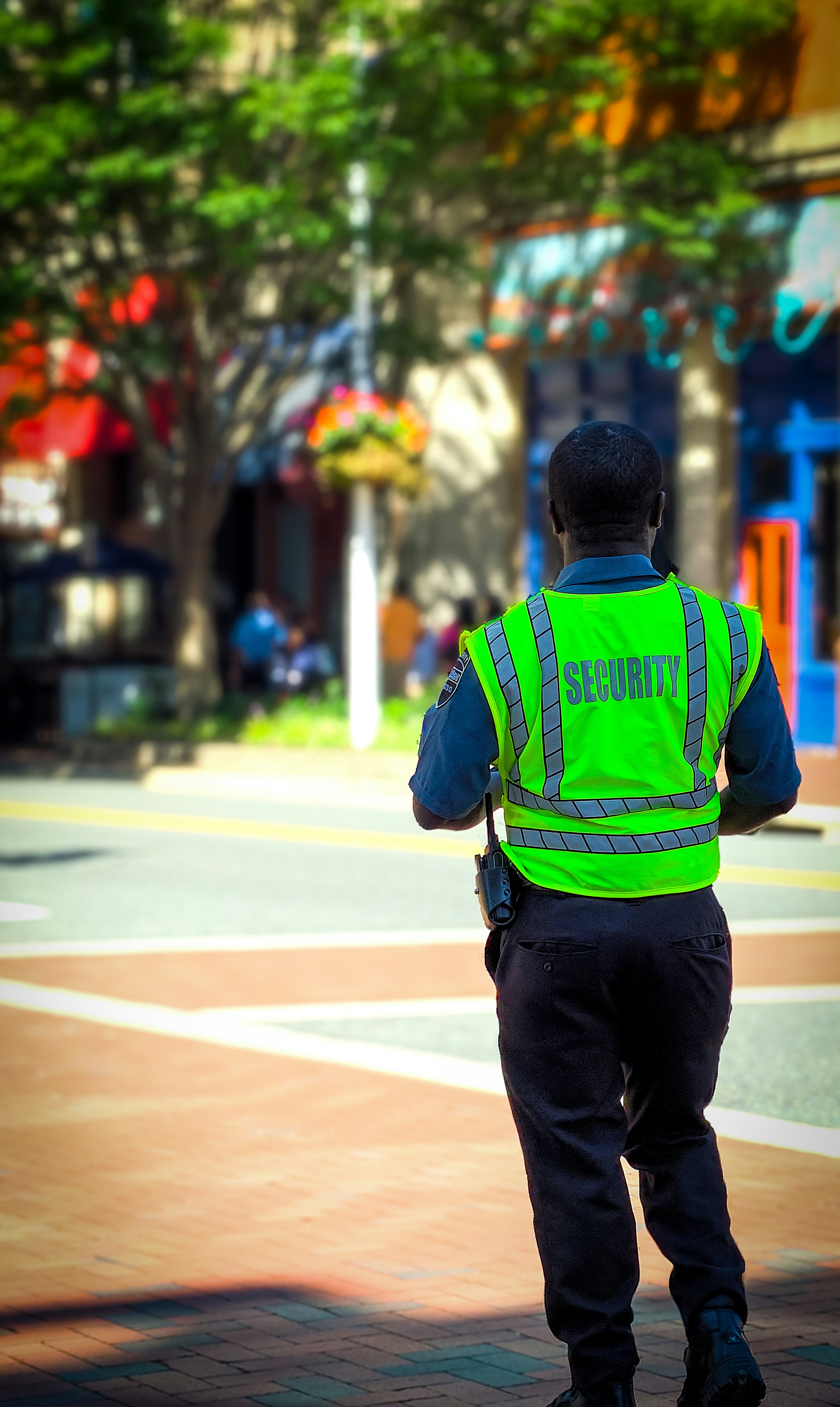 Security officer on foot patrol at an outdoor venue